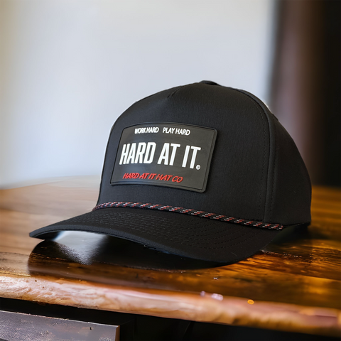 HARD AT IT® SnapBack Hat